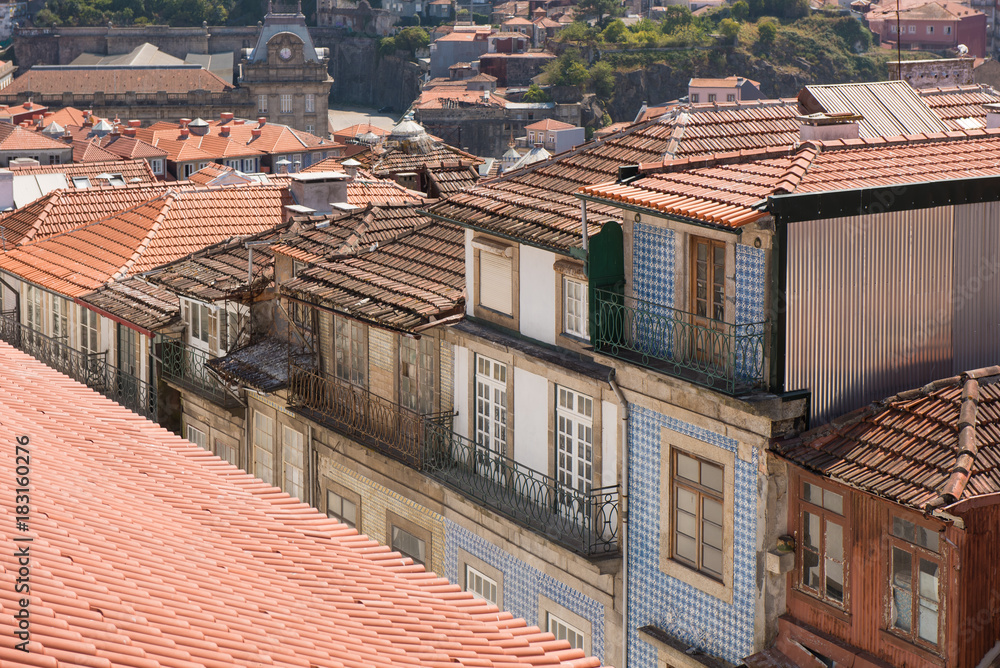 Colored facades and roofs of houses in Porto.