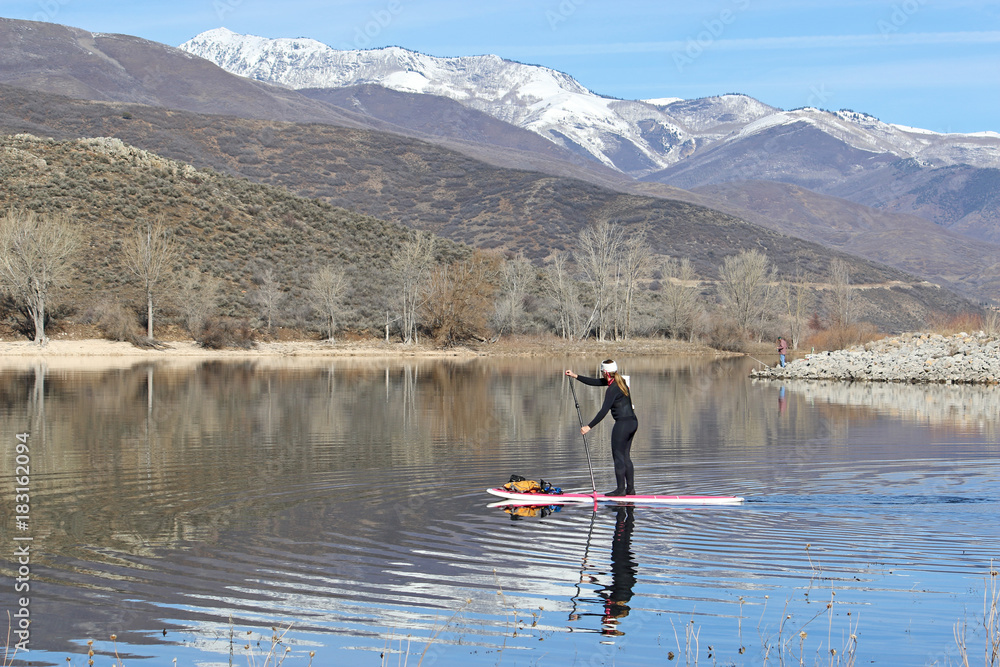 Paddle boarder on Deer Creek Reservoir, Utah Paddle boarder on Deer Creek Reservoir, Utah