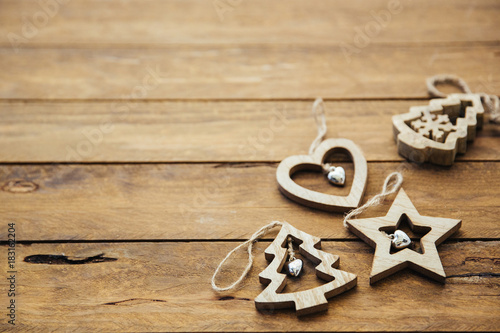 Christmas decorations over wooden background