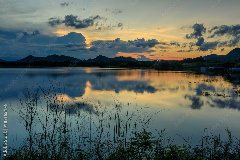 Beautiful sunset on lake in the hill. Beautiful sunset on lake in the hill.