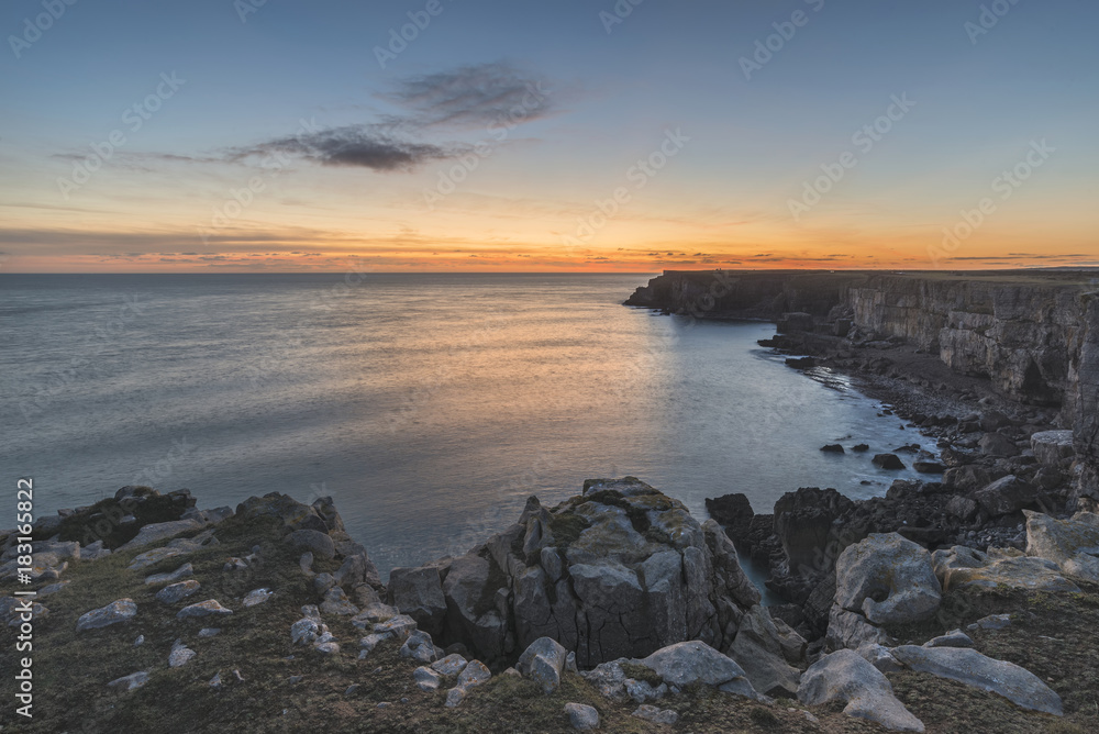 Stunning vibrant landscape image of cliffs around St Govan's Head on Pembrokeshire Coast in Wales Stunning vibrant landscape image of cliffs around St Govan's Head on Pembrokeshire Coast in Wales