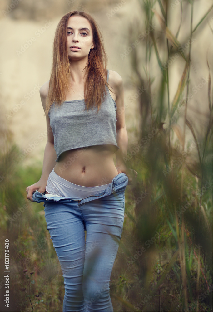Outdoors portrait of a beautiful woman undresses Stock Photo Adobe Stock