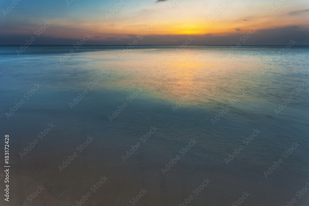Tropical beach at sunset.