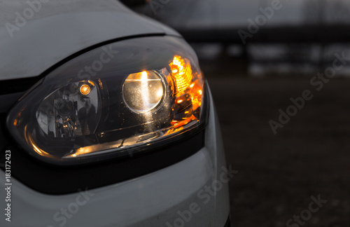 car a headlight with a lens