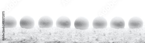 Christmas New Year composition balls with snow line white background fir tree toy concept web design banner panorama ultra wide