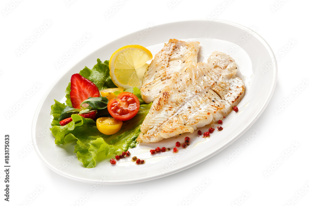 Fish dish - fried fish fillet and vegetables Fish dish - fried fish fillet and vegetables