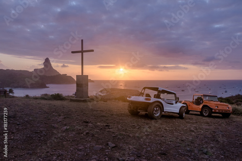 Fotografie Buggies and Sunset View from Chapel of Sao Pedro dos Pescadores with Morro do Pi