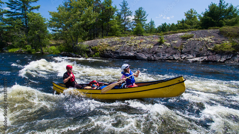 Aerial photo of a family whitewater canoe trip