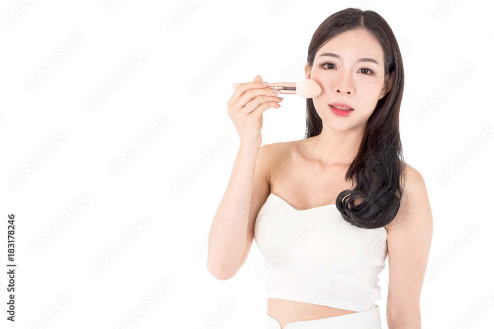 Woman holding make-up brushes isolated on white background Woman holding make-up brushes isolated on white background