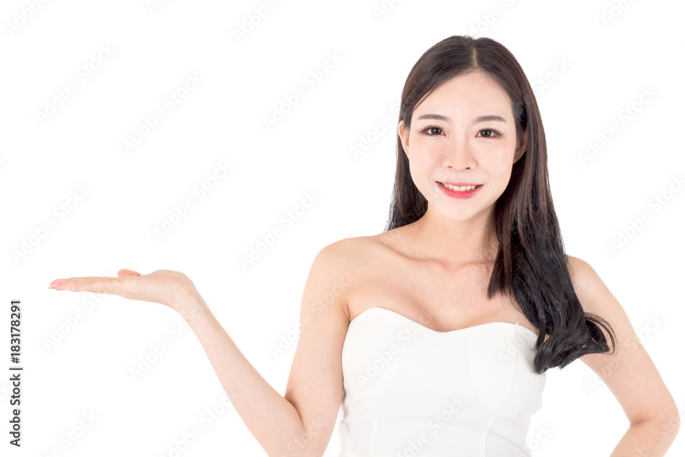 Beautiful young woman showing open hand palm presenting with copy space for product isolated on white background Beautiful young woman showing open hand palm presenting with copy space for product isolated on white background