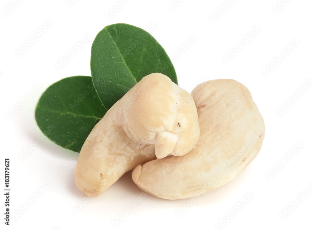 cashew nuts with leaf isolated on white background. macro cashew nuts with leaf isolated on white background. macro