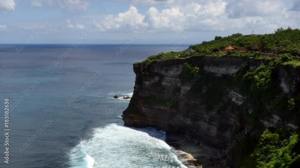 Waves beach in ocean on Indonesia. Unique landscape of islands Waves beach in ocean on Indonesia. Unique landscape of islands