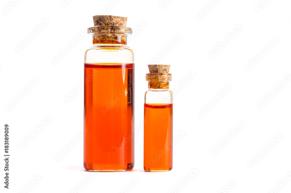 Two bottles with oil isolated on white background Two bottles with oil isolated on white background