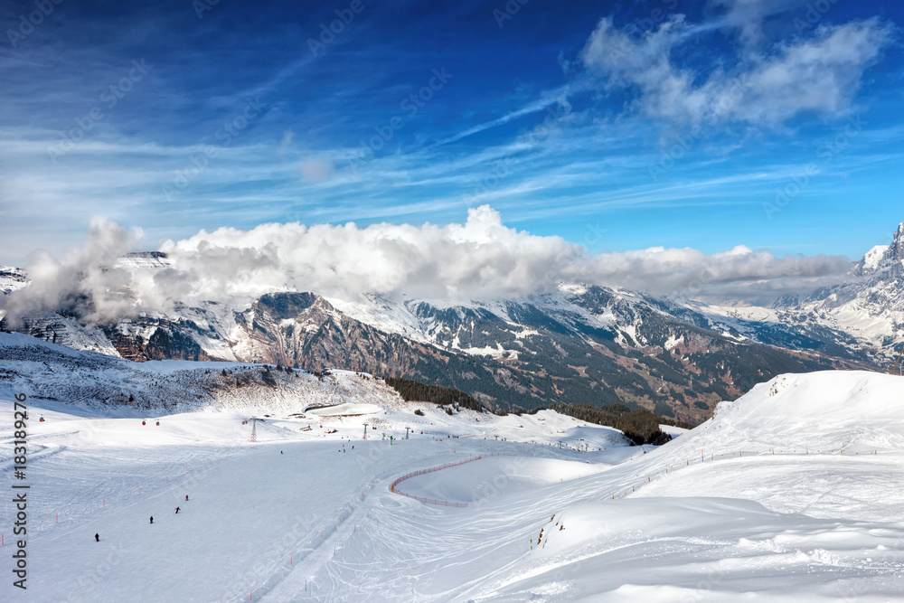 Ski slope in Grindelwald in Bernese Alps, Switzerland Ski slope in Grindelwald in Bernese Alps, Switzerland