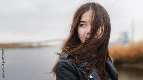 Pretty young woman portrait outdoors © kulichok