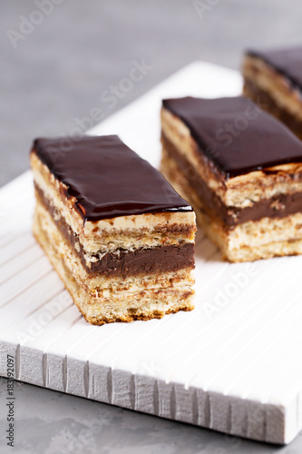 Cake Opera on a gray background, vertical, selective focus