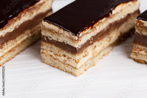 Cake Opera on a gray background, vertical, selective focus