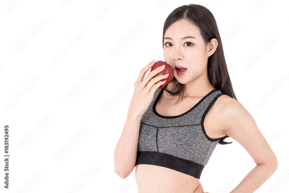 Sport healthy woman holding a red apple isolated on white background Sport healthy woman holding a red apple isolated on white background