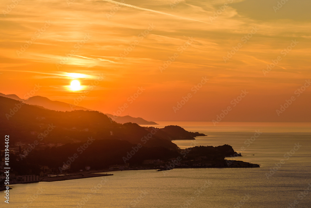 Beautiful sunset on the sea. The coastline of the island of Samos in the time of sunset, Samos island, Greece