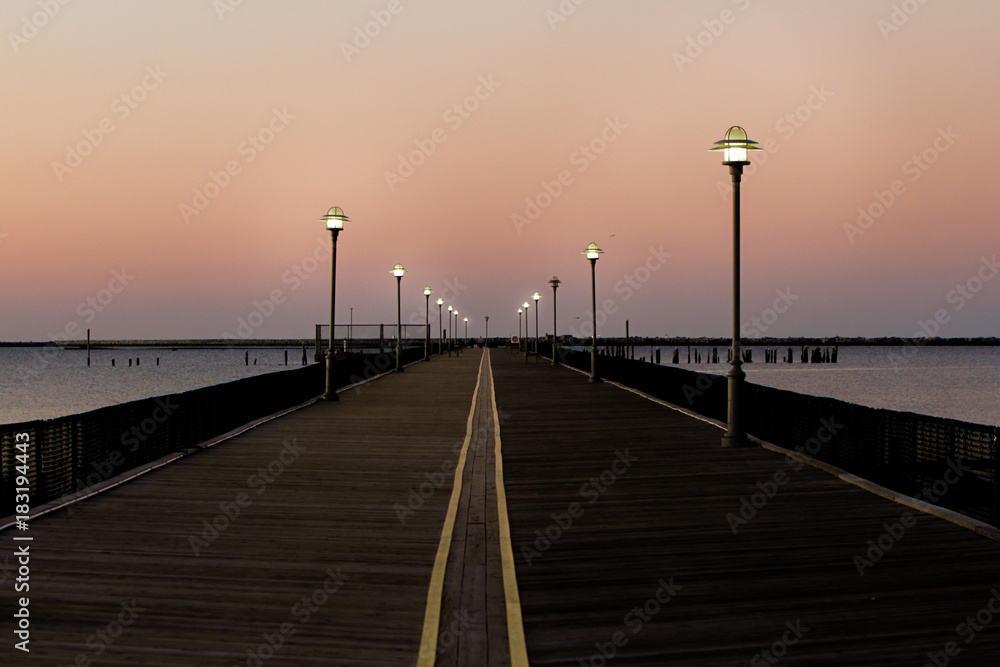 empty fishing pier sunset