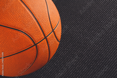Basketball ball on black background copy space © Prostock-studio