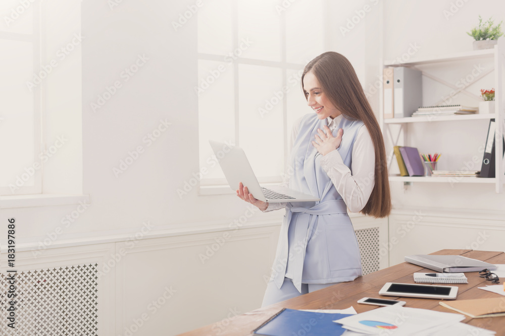Young business woman using laptop at office Young business woman using laptop at office