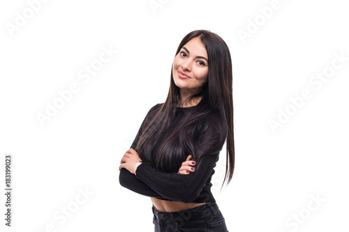 Portrait of a beautiful woman standing with hands folded and looking at camera over white background © F8  \ Suport Ukraine