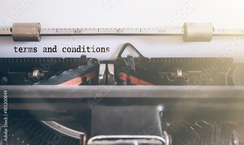 words terms and conditions written on vintage manual typewriter