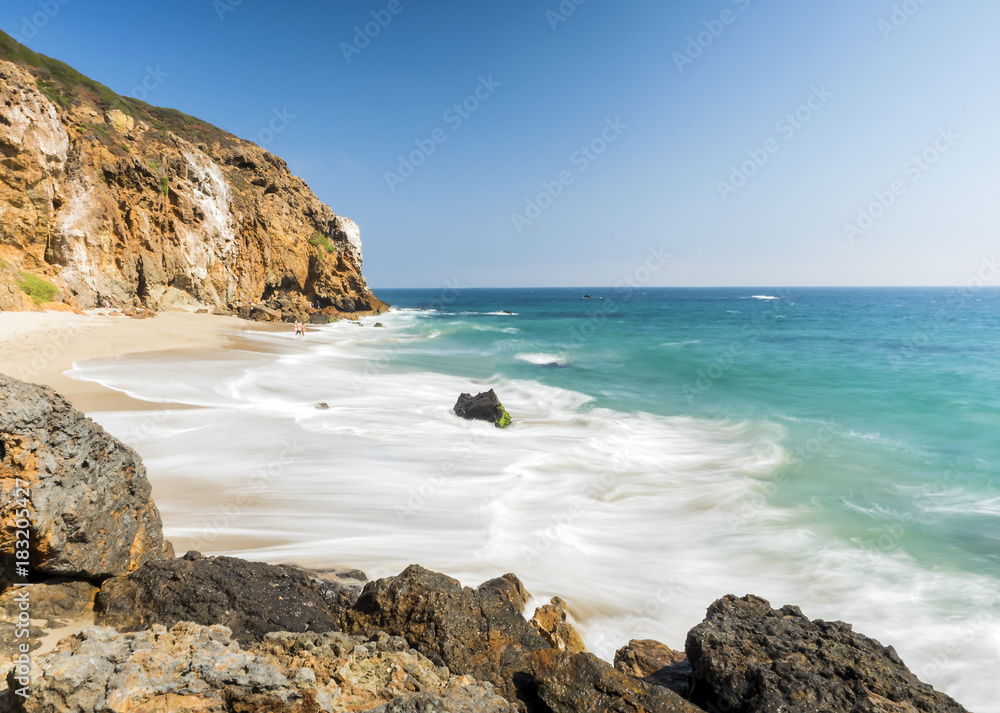 Dume Cove Malibu, Zuma Beach, emerald and blue water in a quite paradise beach surrounded by cliffs. Dume Cove, Malibu, California, CA, USA
