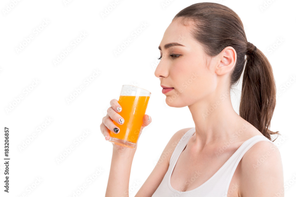 Woman holding orange juice isolated on white background Woman holding orange juice isolated on white background