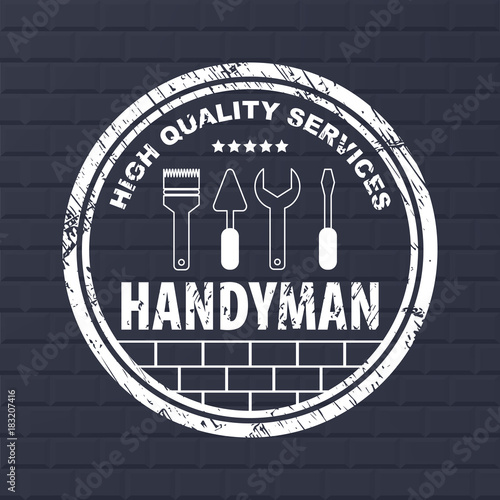 Professional handyman services logo.  Stamp handyman services on dark bricks background.  Stamp with dry rough edges. Flat design. Vector illustration EPS10.