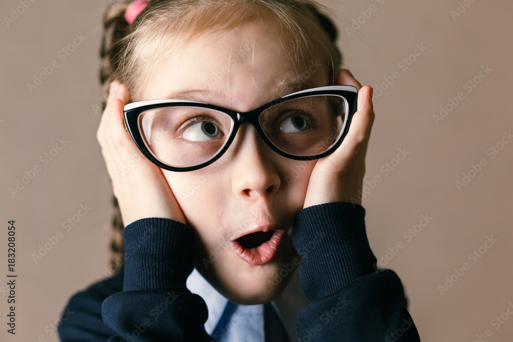 Surprised little girl with glasses Surprised little girl with glasses
