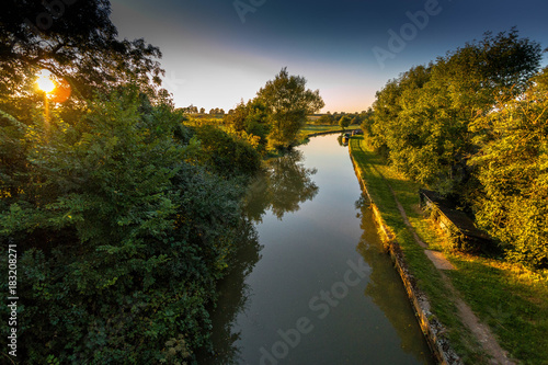 Grand Union canal in the summer evening sunlight 