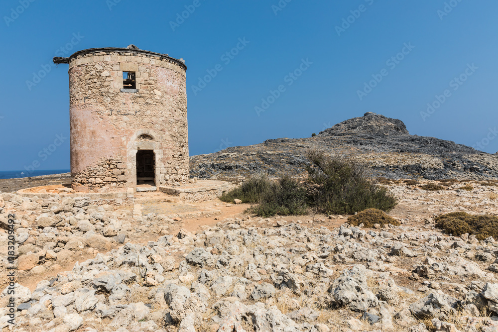A ruined mill on the way to the Kleoboulous's tomb in Lindos on the Rhodes Island, Greece. 