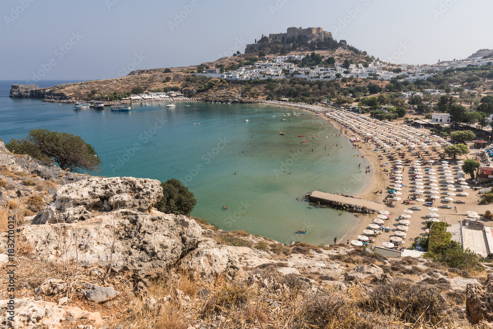 Acropolis, the second largest and most significant in Greece, and white houses in Lindos on the island of Rhodes