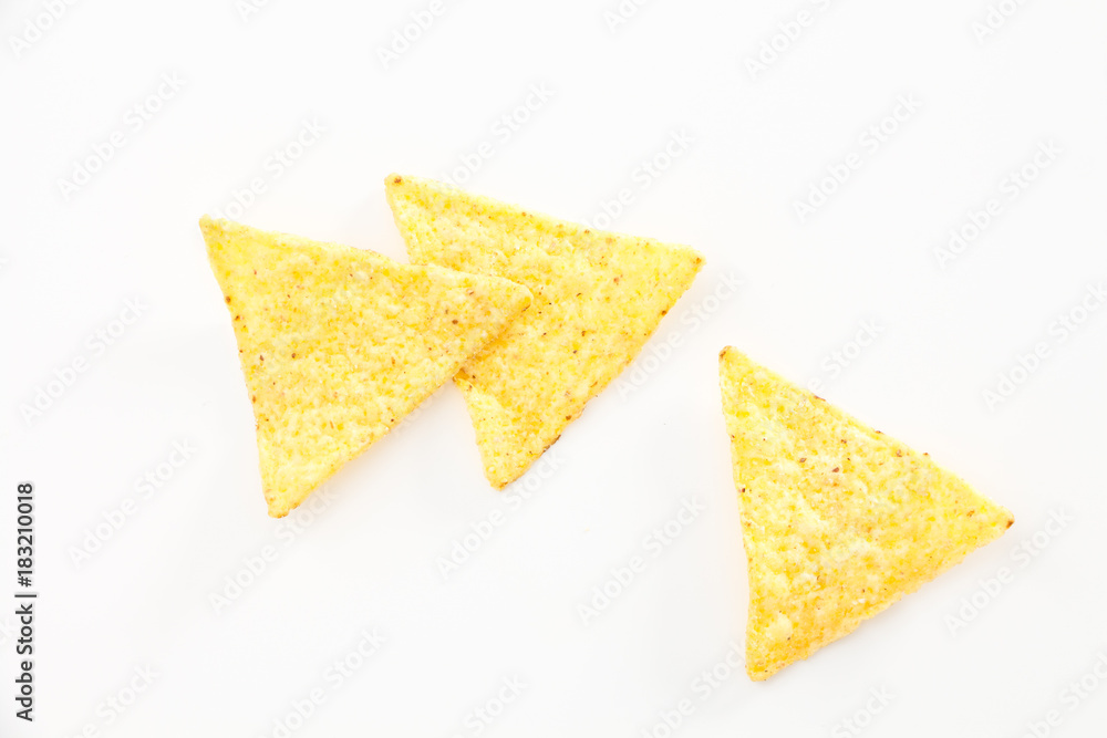 Crispy nacho chips, on white background. Crispy nacho chips, on white background.