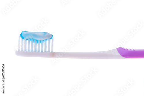 Toothbrush with toothpaste isolated on white background