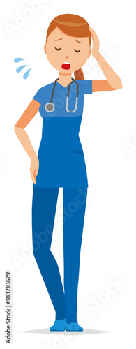 A woman nurse wearing a blue scrub is tired