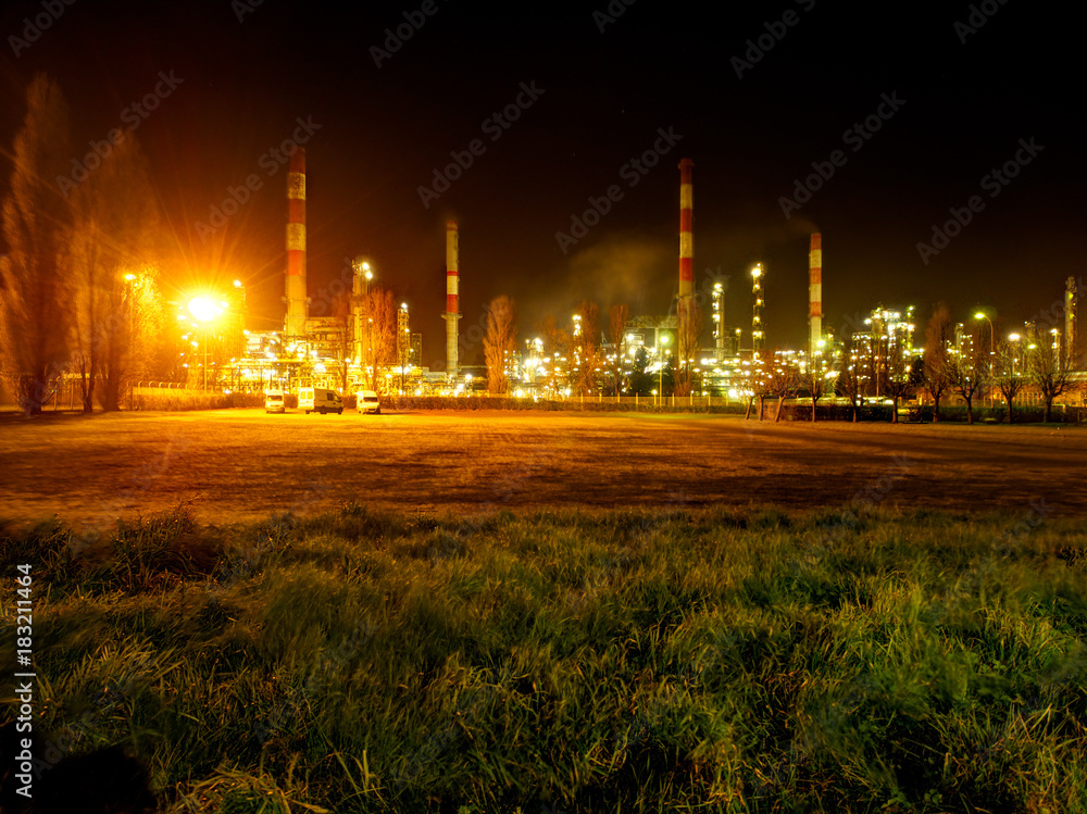 view of a petrochemical power plant at night