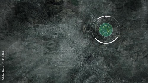 Surveillance drone camera scanning a big american city, POV of drone or satellite with HUD and heat camera monitoring a city suburb in the USA
