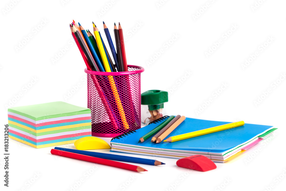 colored pencils in the basket, Eraser and pencil sharpener on white background colored pencils in the basket, Eraser and pencil sharpener on white background