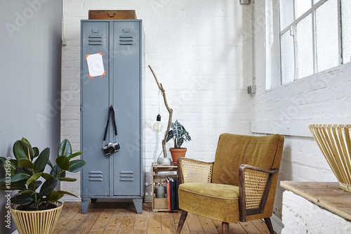 green urban living room in industrial loft vintage furniture