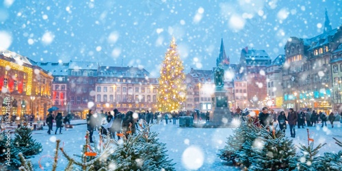 Fototapeta Naklejka Na Ścianę i Meble -  Christmas market under the snow in Strasbourg, Alsace, France