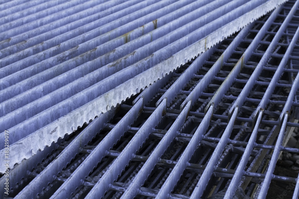 Iron grates stacked up with patterns Iron grates stacked up with patterns