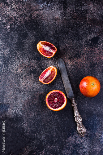 Fototapeta Naklejka Na Ścianę i Meble -  Sicilian oranges on a black slate background.