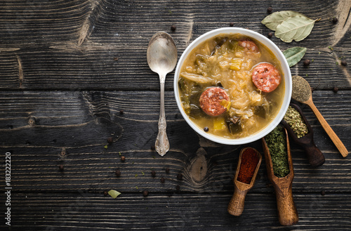 Slovak christmas cabbage soup with mushrooms on natural background. photo