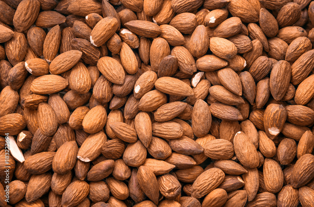 Almonds close-up top view. Background, texture. Almonds close-up top view. Background, texture.