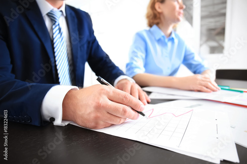 Wallpaper Mural Businessman signing document in office Torontodigital.ca