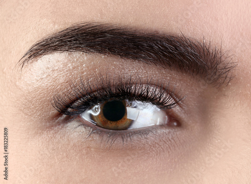 Female eye with eyelash ext...
