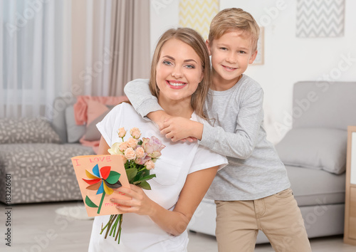 Young woman with her little...